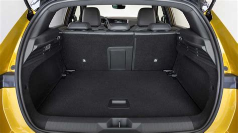 Bagagliaio Opel Astra H con piano di carico